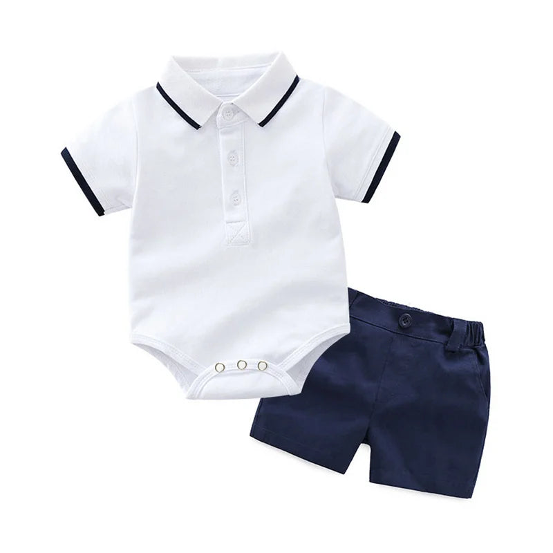 boys white sailer golf shirt and blue shorts.