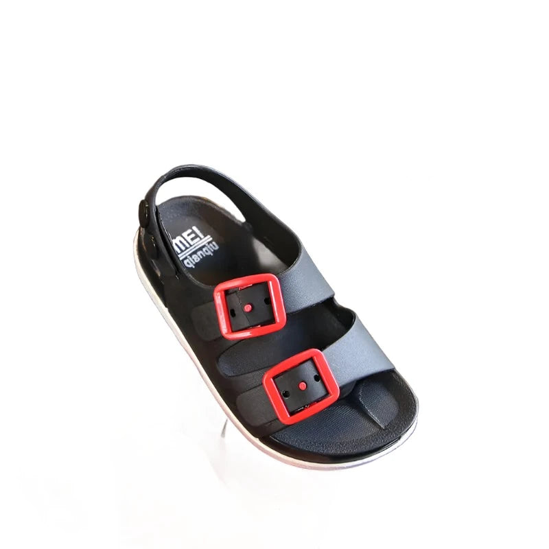 Black waterproof kids sandals with two straps on the top with red buckles and a strap on the heal with snaps.