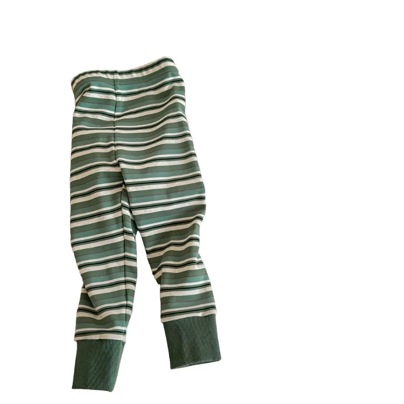 Girls leggings that are stripped in shades of green.