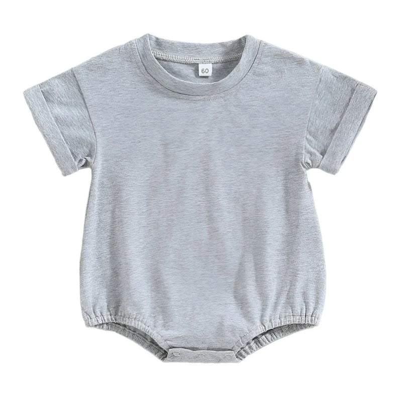 Grey Tshirt bodysuit with elastic legs and a snap bottom.