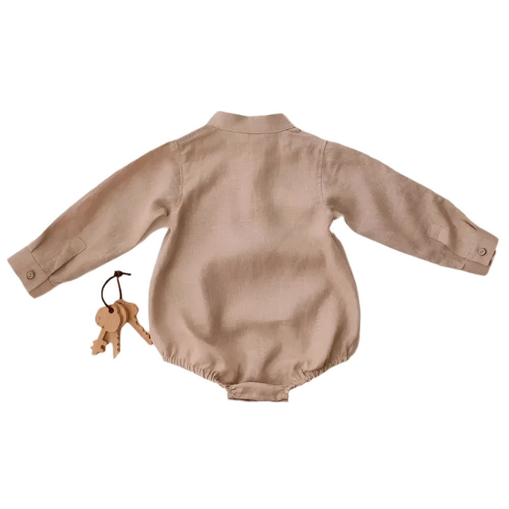 Back view of baby long sleeved linen shirt in light beige.