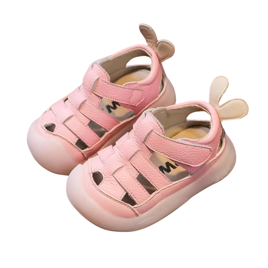 leather strap sandals with a velcro closure for babies and toddlers.