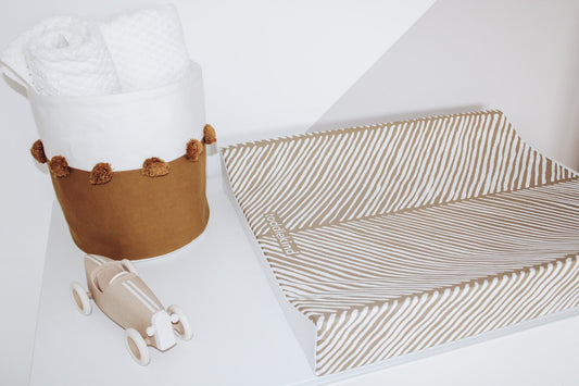 Ocean Leaves Changing Mats in Tan