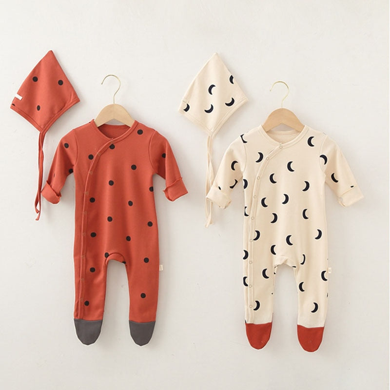 Ivory Infant sleeper swith matching hat, in red with a black dot and ivory with a moon graphic