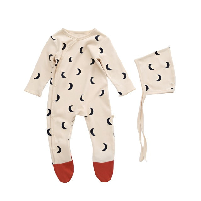 Ivory Infant sleeper with matching hat, with black moons  and red feet