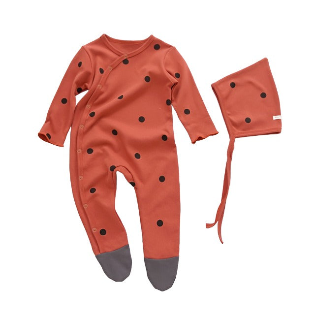 red Infant sleeper with matching hat, with black dots