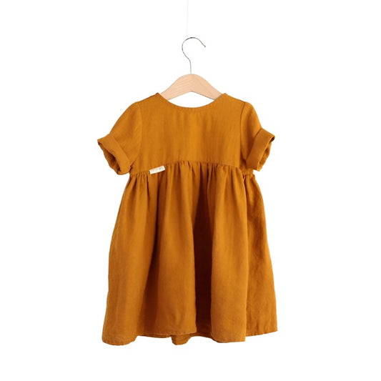 Orange girls linnen summer dress with an o neck, kalf length gathered skirt and rolled up short sleeves.