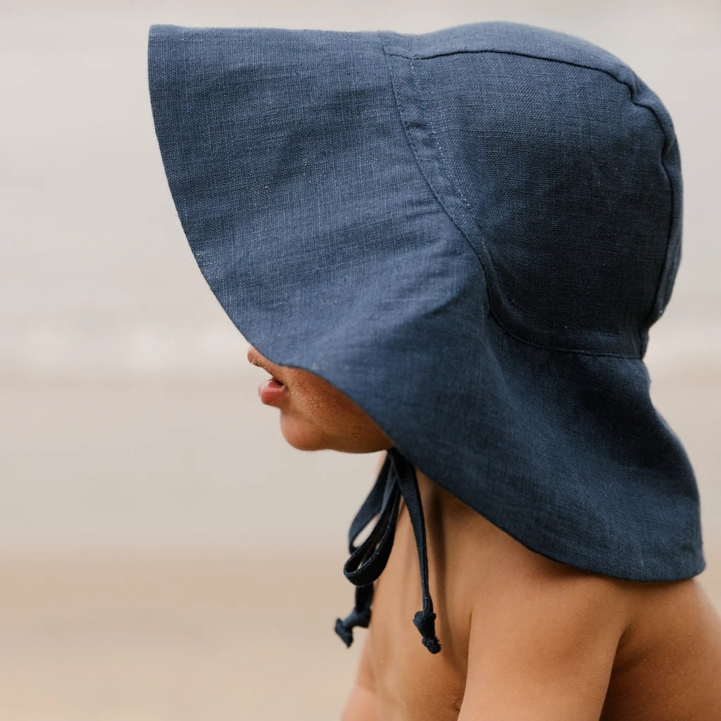 Blue baby bonnet with ties