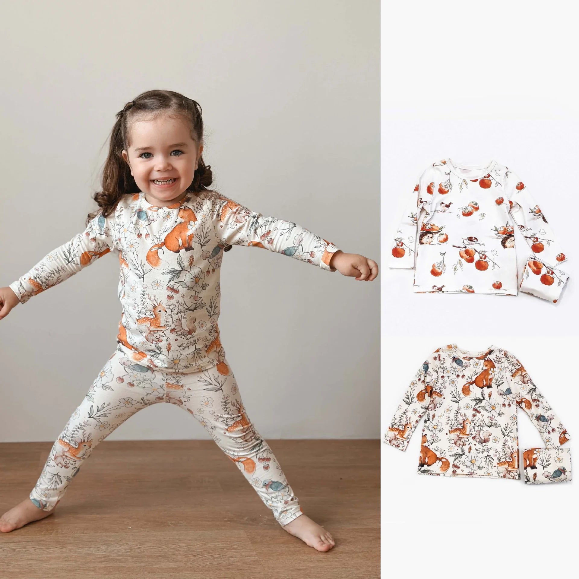 A girls wearing cute Cute children´s pajamas that are unisex. They have graphics on them such as birds with fruits in a reddish color or light orange squirls in delicate bushes. The girl is around 5 or six and is happy to be wearing her new cotton pajamas.  