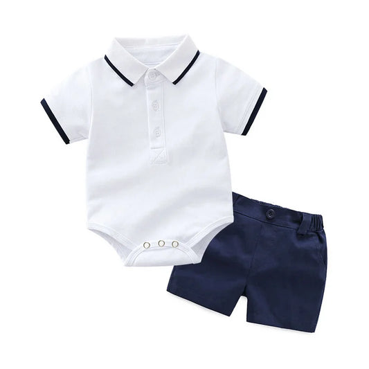 boys white sailer golf shirt and blue shorts. 