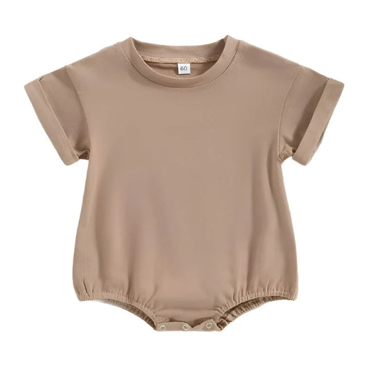beige Tshirt bodysuit with elastic legs and a snap bottom. 