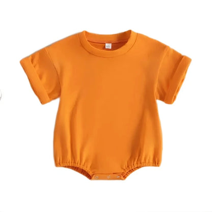 Orange Tshirt bodysuit with elastic legs and a snap bottom. 
