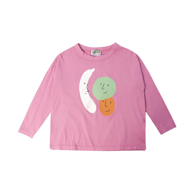 pink baby longsleeved shirt, pink toddler shirt with a white banana and avocado and orange like graphic