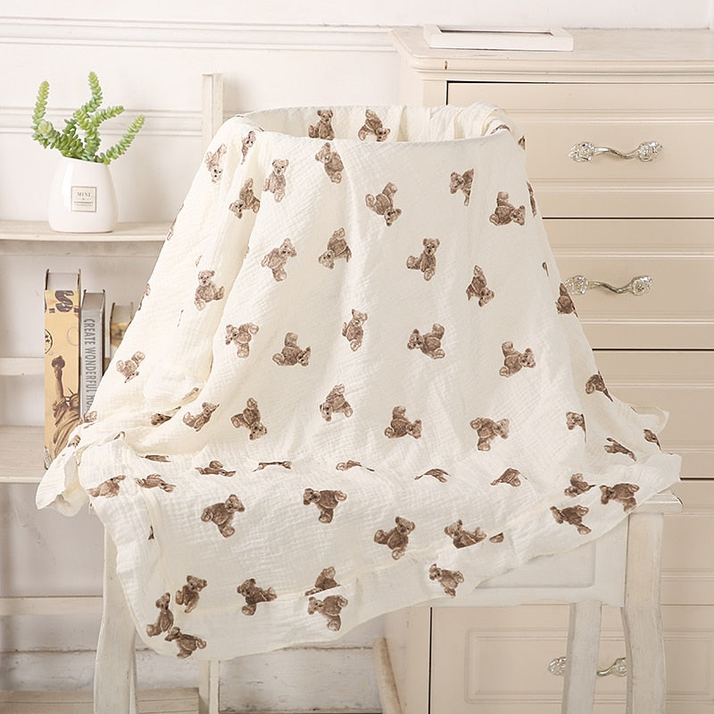 organic cotton recieving blanket with ruffles in the edge.  with teddy bears 