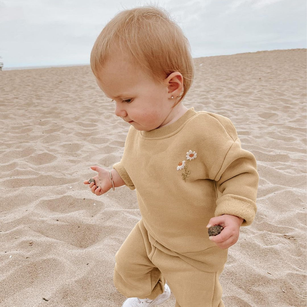 medium Beige cotton sweat suit separates with a flower design size 3 months to 3 years.
