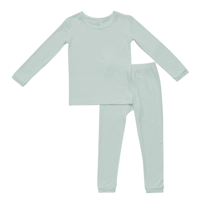 soft green kids pajama separates in sizes 12m to 6y
