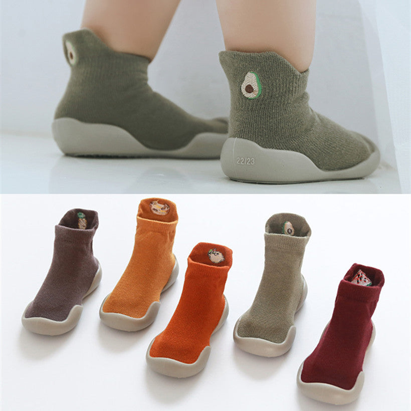 Rubber sole comfortable and flexible childrens sock shoes in red, orange, yellow, green and brown. 