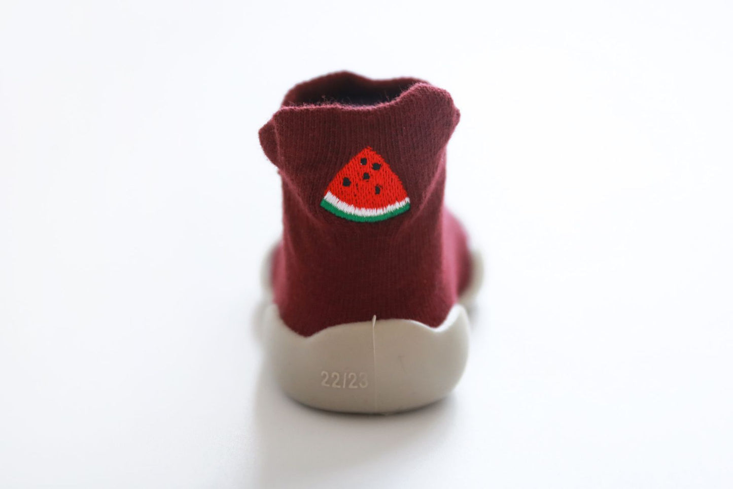 Burgandy red sock shoe, childrens shoe with a  watermellon slice  on the heal