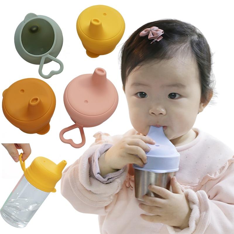 little girl with Baby silicone sippy cup covers