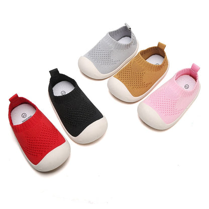 Rubber bottom toddler and kids shoes that look like running shoes. They are perfect for outdoor play or the beach. 