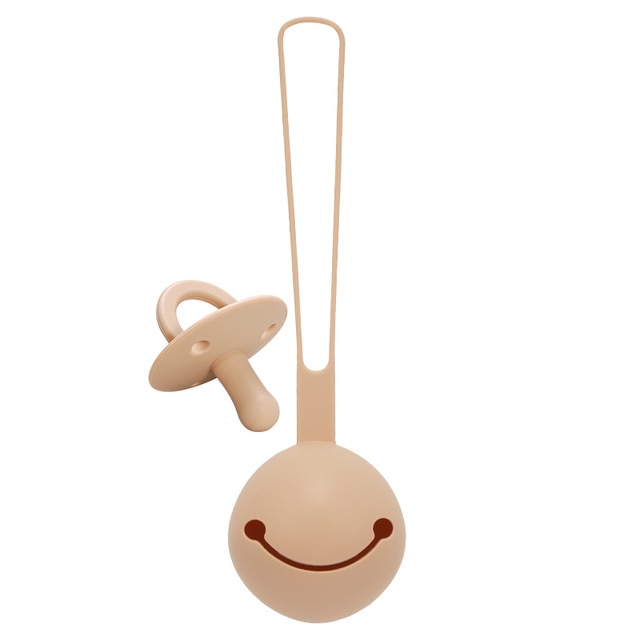 beige pacifier and pacifier case