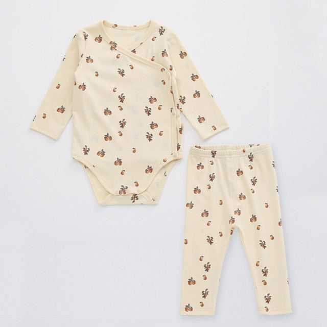 2 Piece set, long sleeved onesie with side and bottom snaps and leggings with a few berries