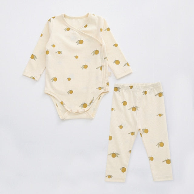 2 Piece set, long sleeved onesie with side and bottom snaps and leggings with lemons