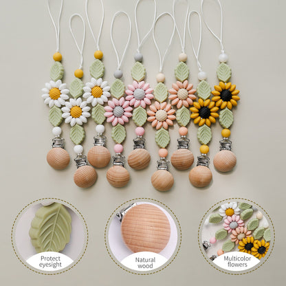 white, pink, peach yellow sunflower pacifier clips with green leaves