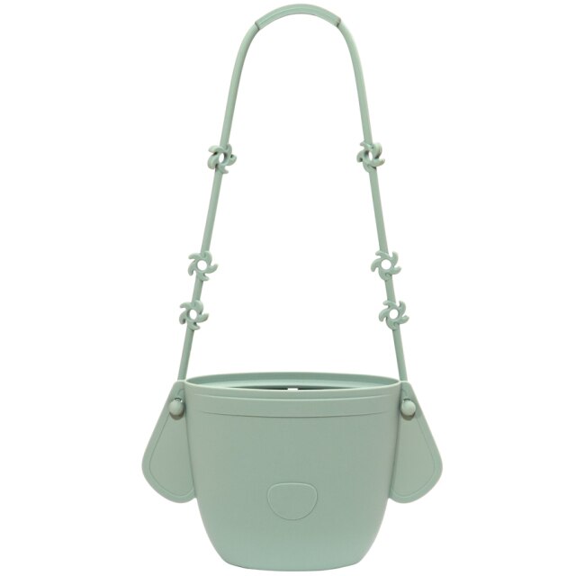 Cute sage silicone kids re-sealabe purse for snacks. 