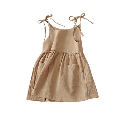 summer girls dress with ties at the shoulder, ruffled skirt, and front pockets in kahki